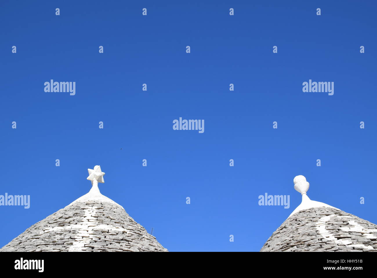 Apulia Symbol The typical conical roof of trulli houses and its symbols in ...