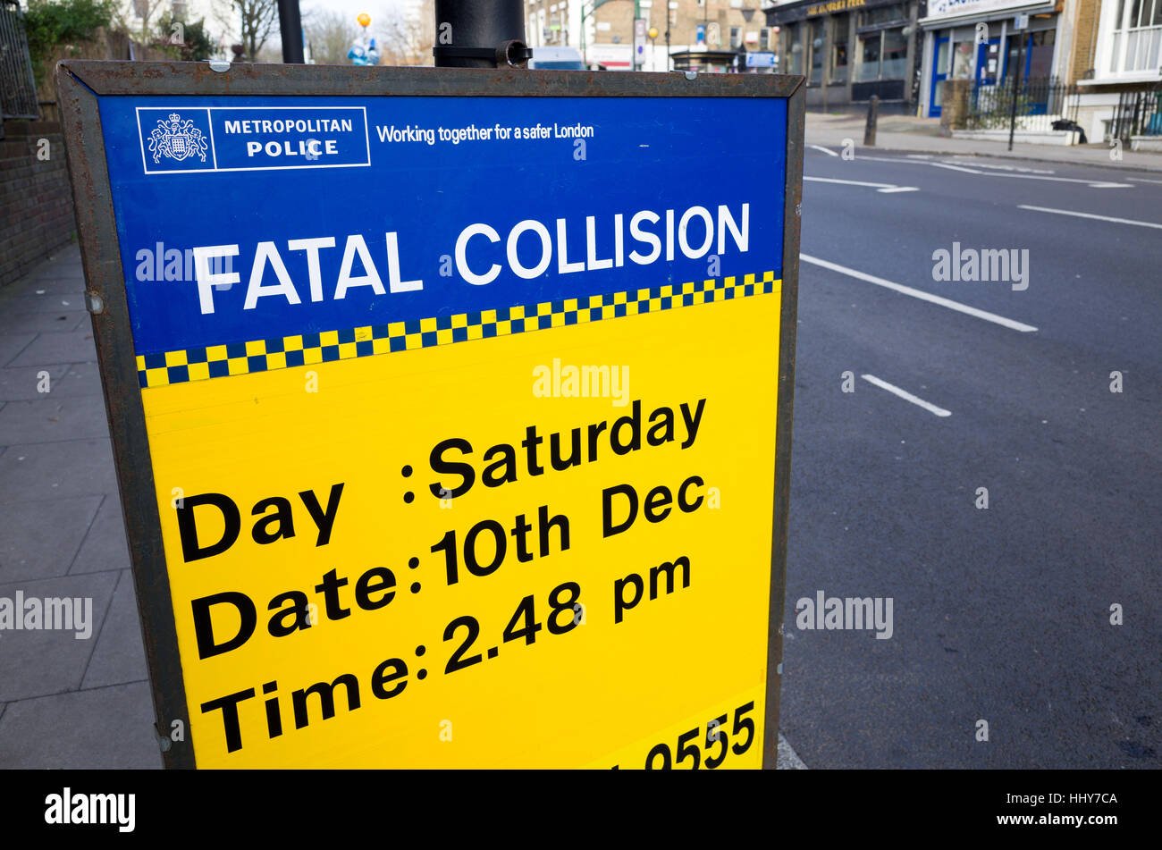 Police Fatal Collision sign beside where a teenager was killed in a road traffic accident, London, England, UK Stock Photo