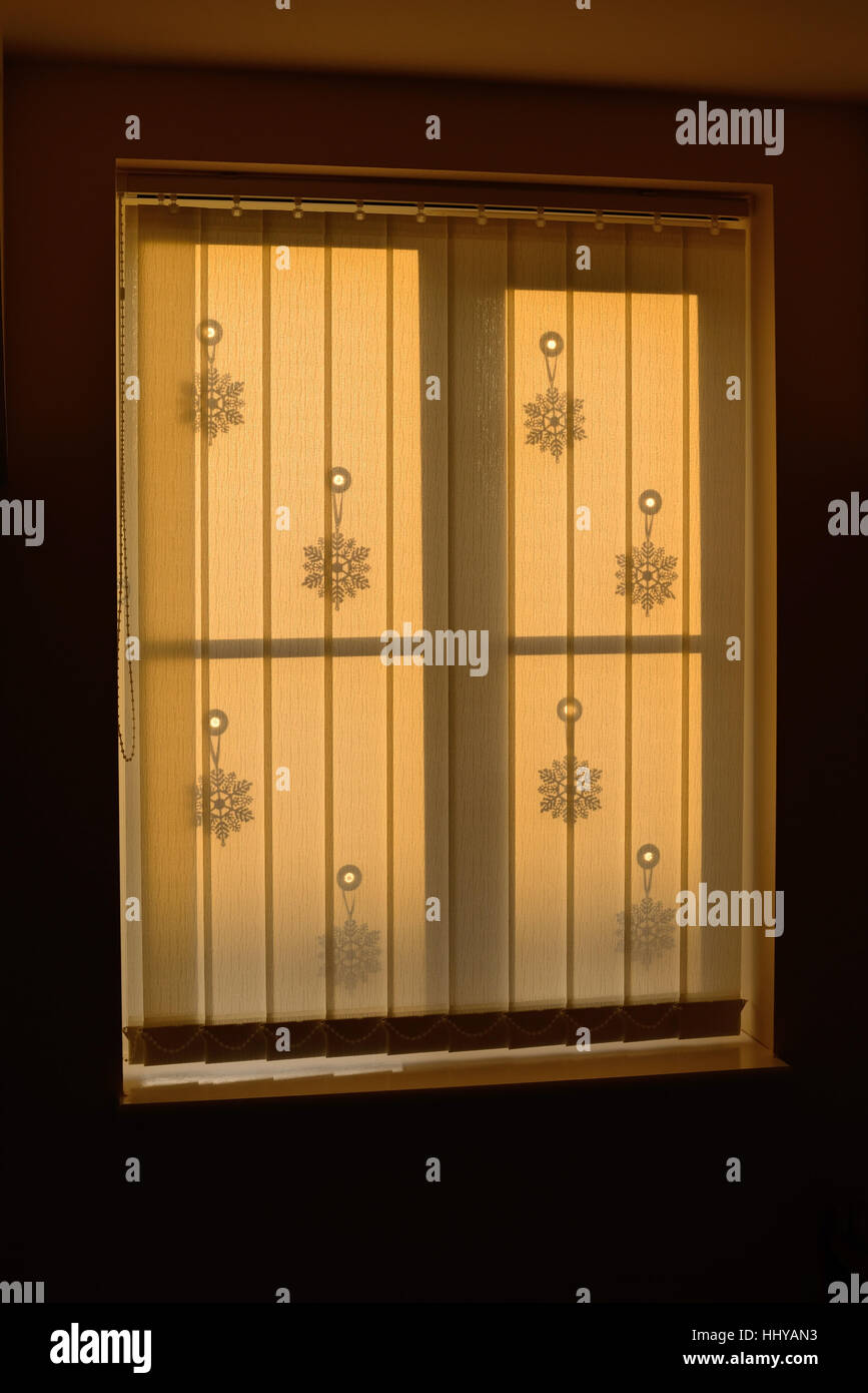 Vertical Blinds At A Window With Christmas Decorations Stock Photo Alamy