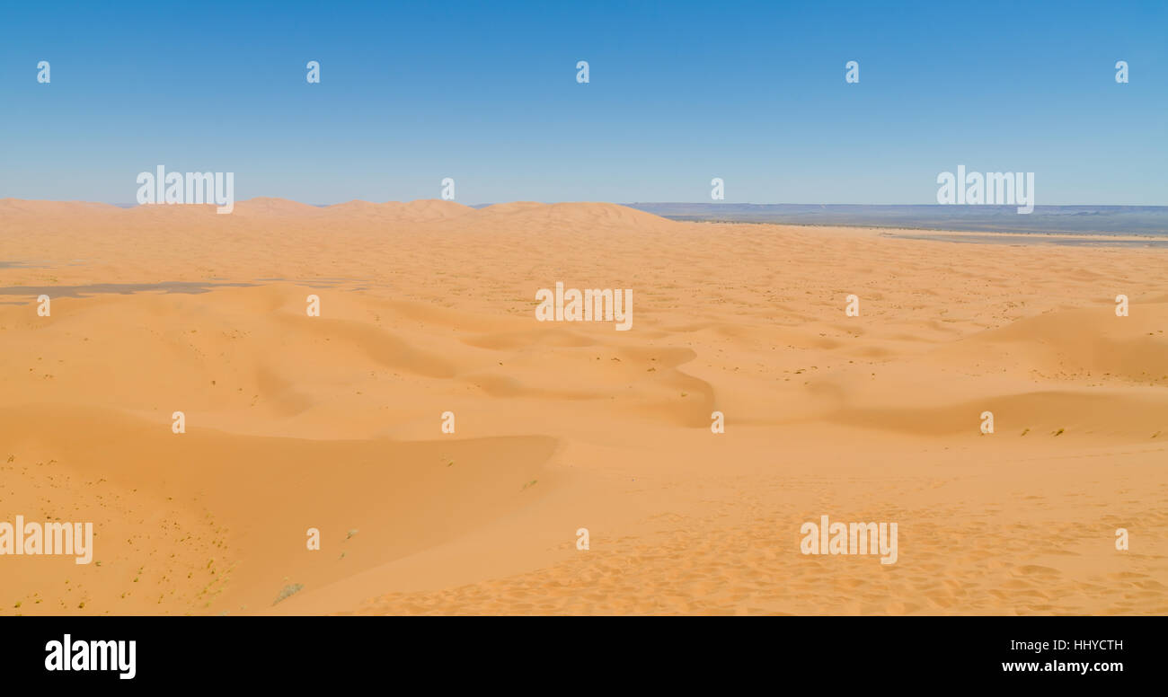 Famous and inconic sahara sand dunes of Erg Chebbi in the Moroccan desert near Merzouga, Morocco, North Africa. Stock Photo
