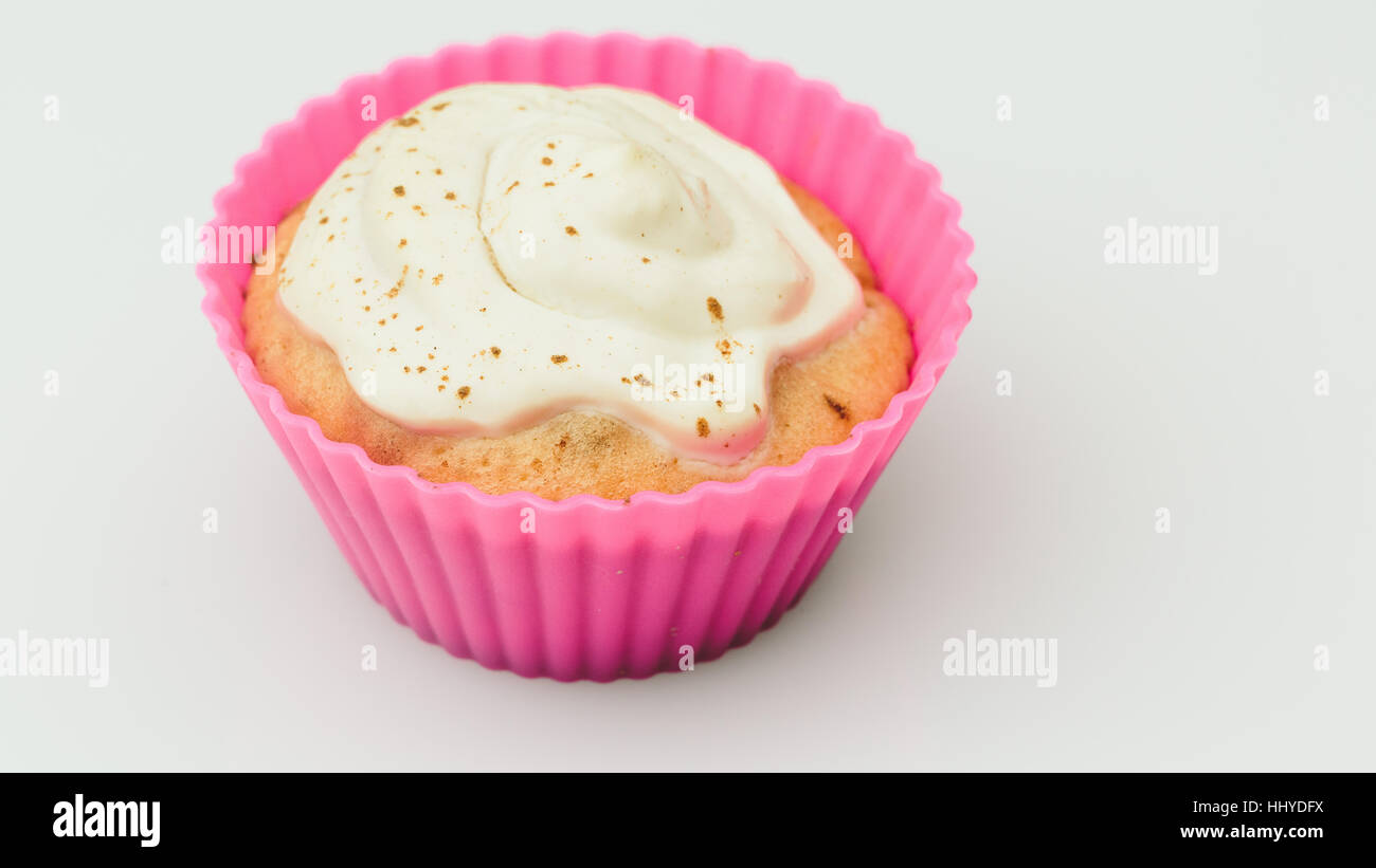 Cupcake home on a white background closeup. Stock Photo
