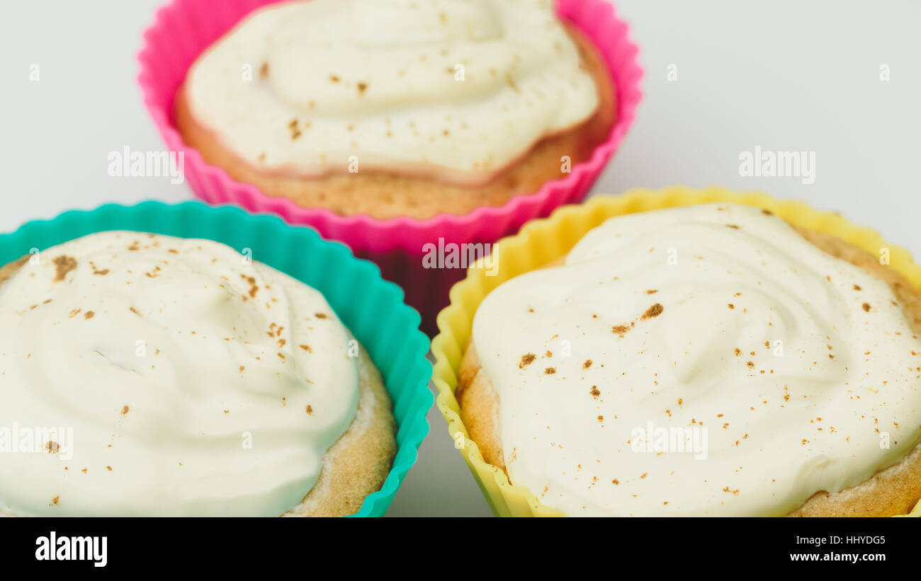 Cupcakes home on a white background closeup. Stock Photo