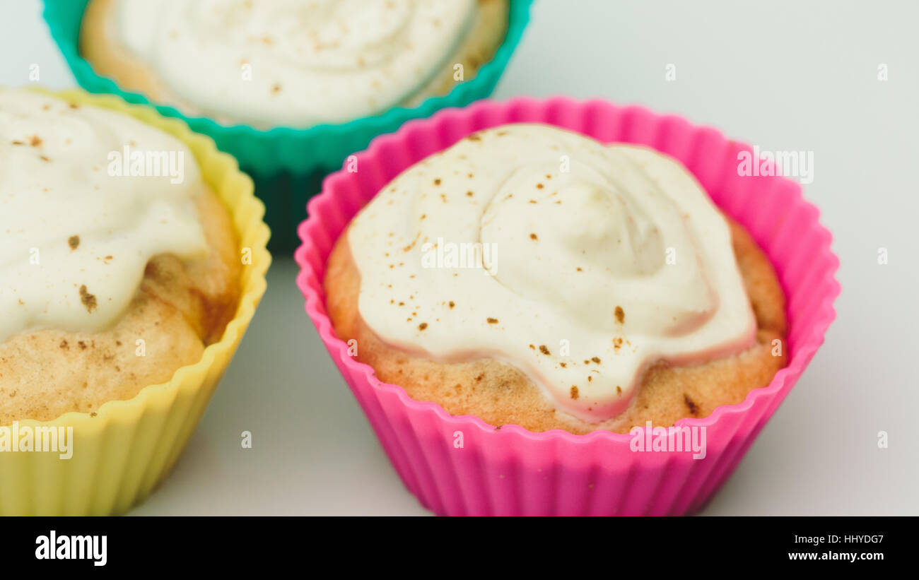 Cupcakes home on a white background closeup. Stock Photo