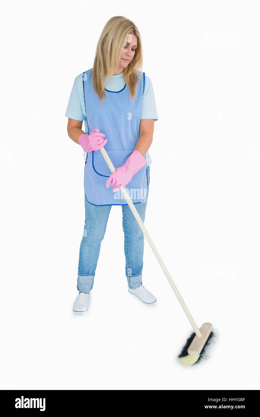 Cleaner woman sweeping the floor Stock Photo - Alamy