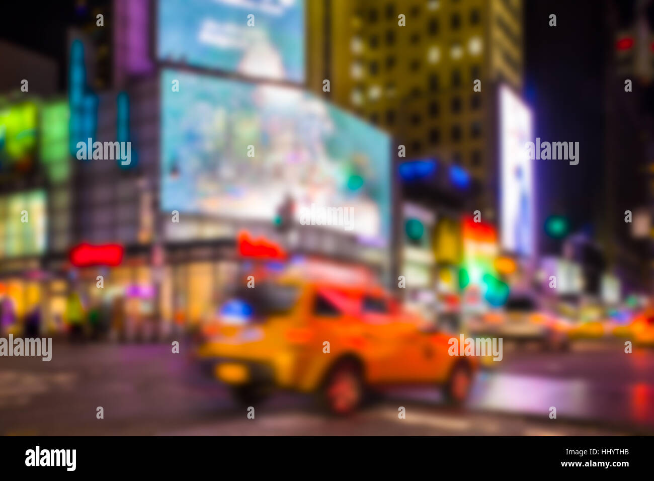 Defocused city blur from Times Square, New York City at night with ...