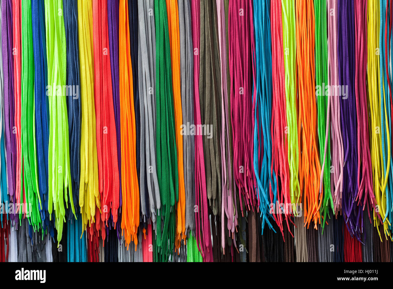 exposed laces of different colors, note shallow depth of field Stock Photo