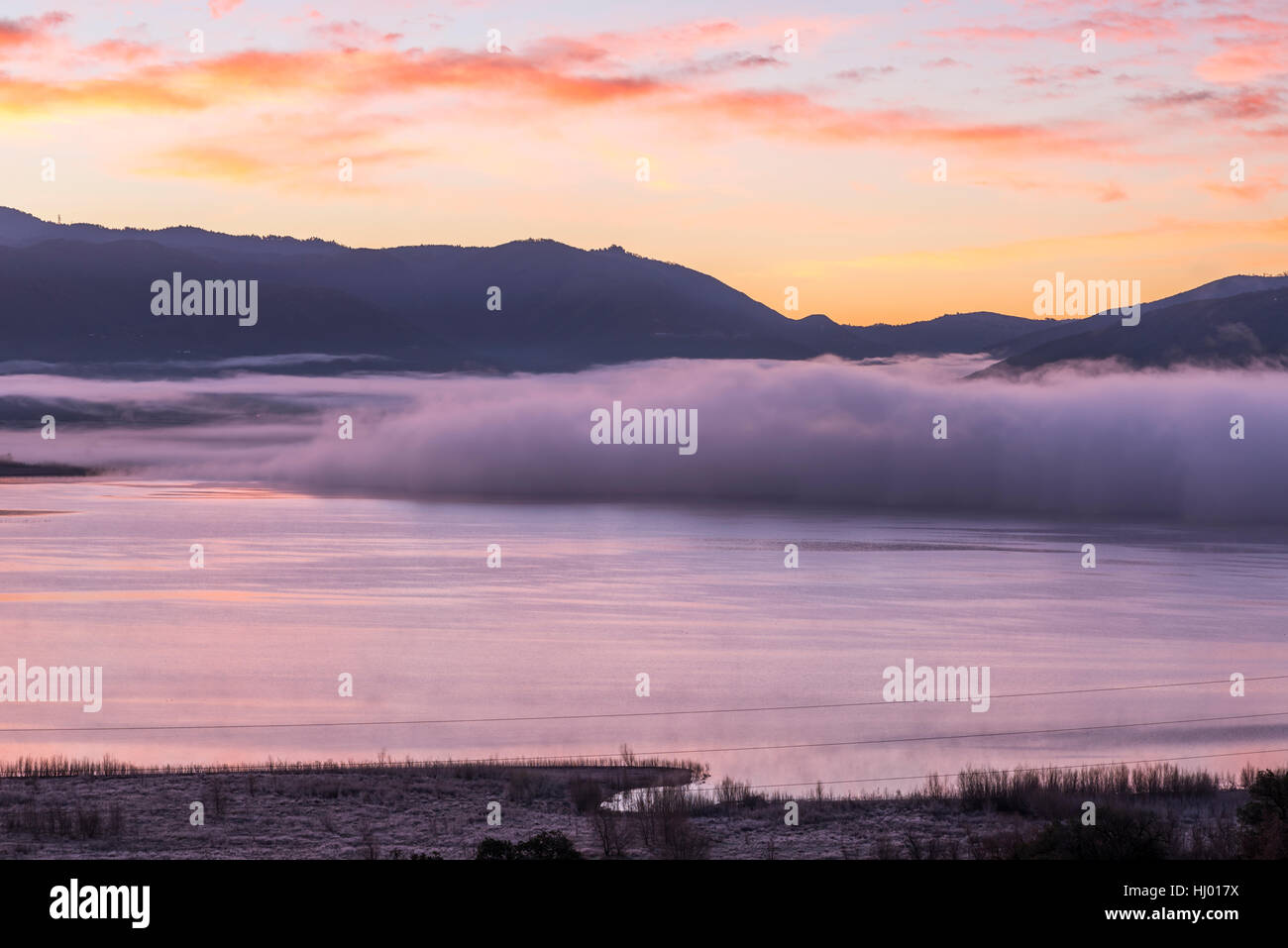 Sunrise fog over mountain hi-res stock photography and images - Alamy