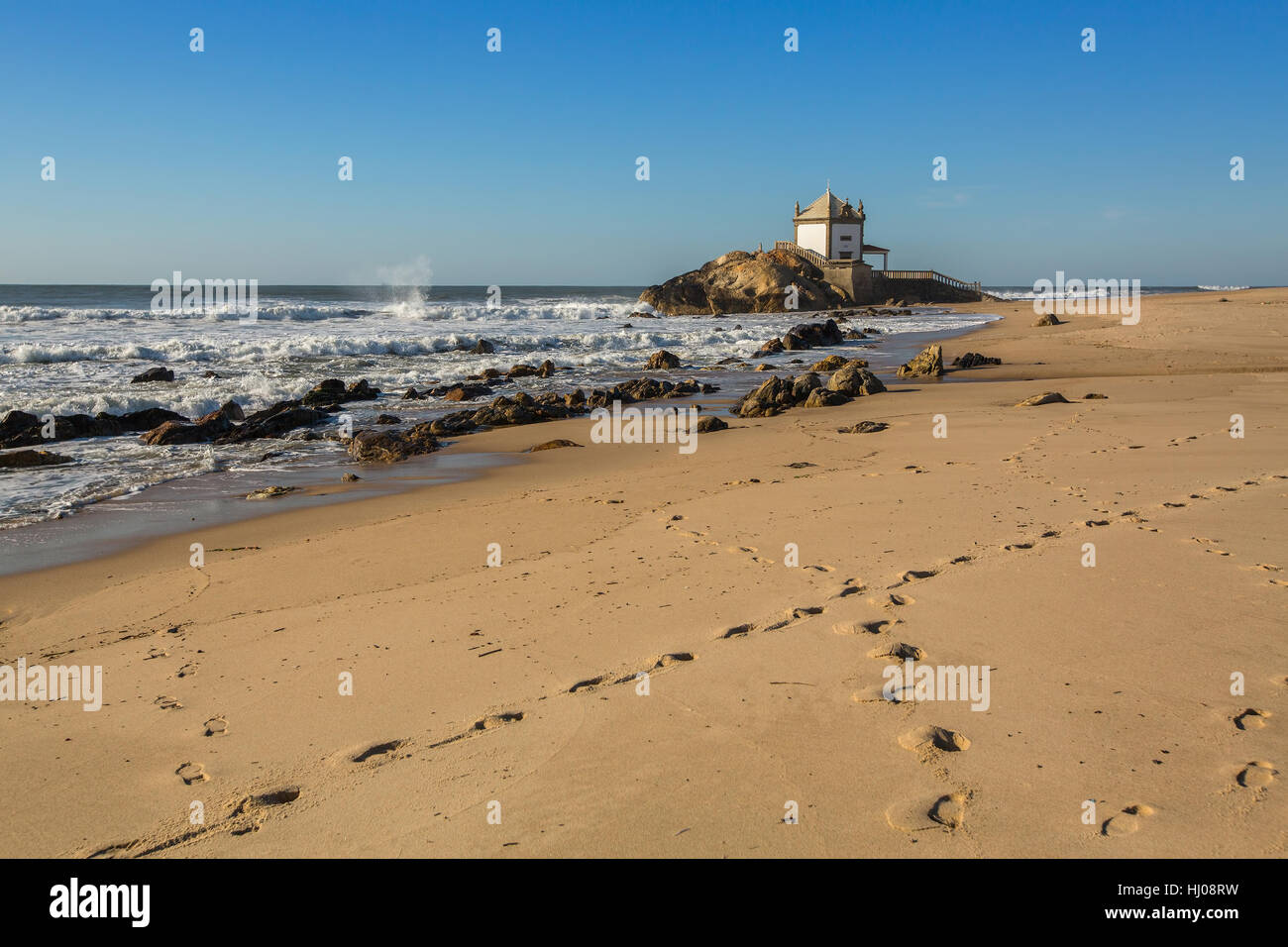 Miramar Beach (Praia de Miramar) and chapel Senhor da Pedra, near Porto,  Portugal Stock Photo - Alamy