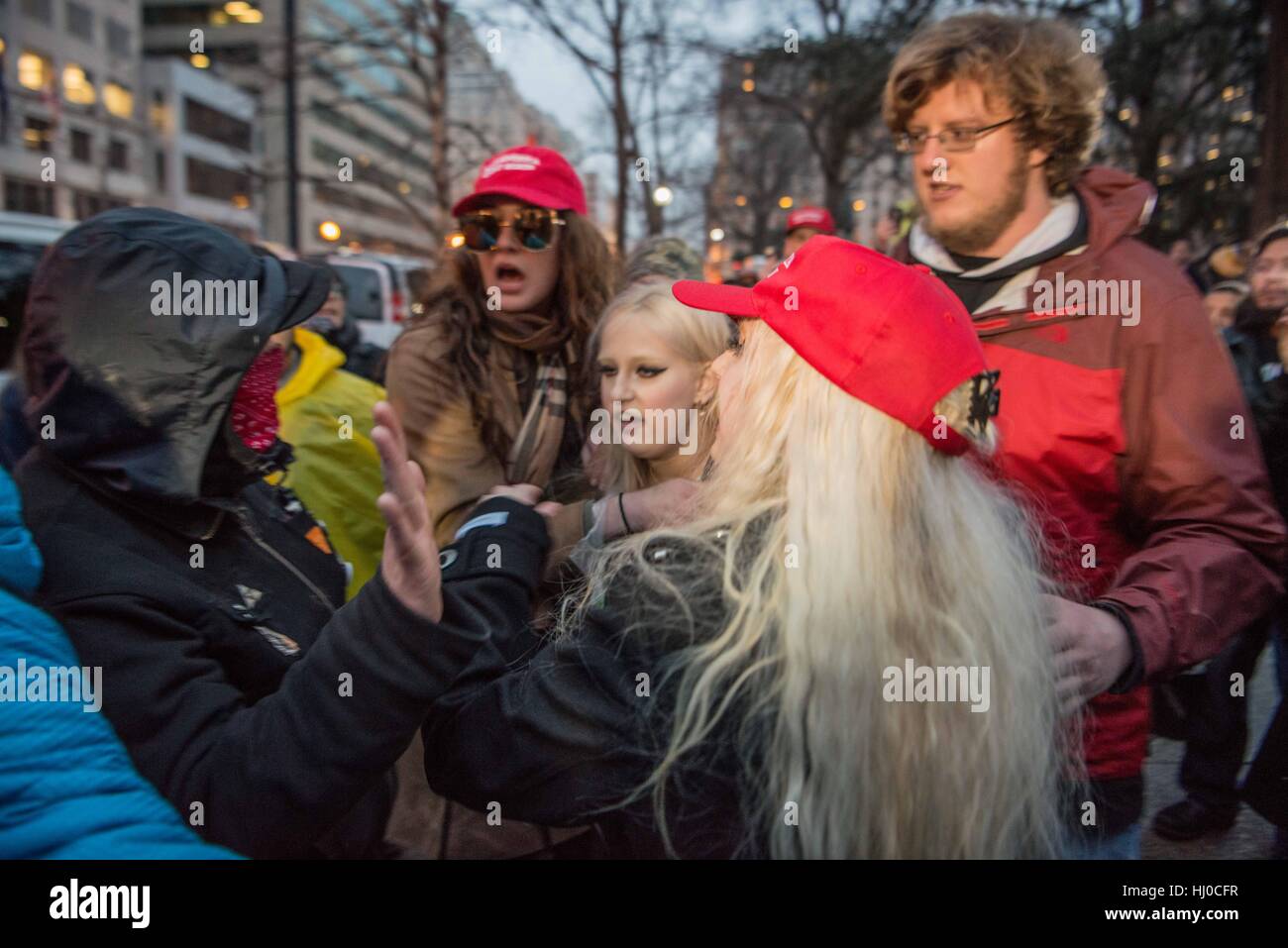 Protestors and supporters clash at the inauguration of President Donald Trump in Washington, D.C. on January 20, 2017. Stock Photo