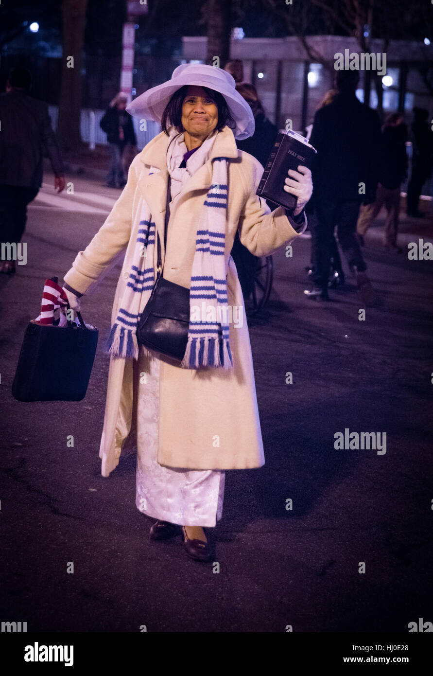 African American Christian woman with Bible preaching love during Trump Inauguration festivities. Trump becomes 45th president of the United States after winning electoral college over Hillary Clinton. Washington DC, USA. 20th Jan, 2017. Stock Photo