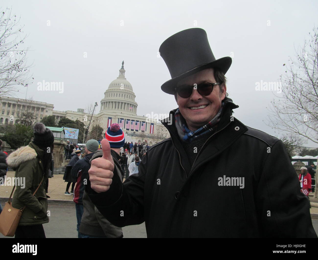 Erik Laykin, trump supporter, is seen on 20 January 2017 in Washington, USA, with a collapsible top hat, a beaver-fur Chestergate from 1880. Hundreds of thousands of Americans gathered to watch an unlikely political figure - former reality TV star Donald Trump - become the 45th president of the United States. Photo: Frank Fuhrig/dpa Stock Photo