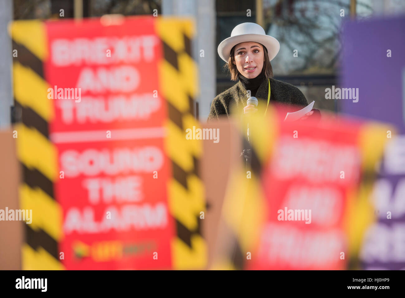 London, UK. 21st January, 2017. Rebecca Hall, actress, introduces speakers outside the US Embassy - Women's March on London - a grassroots movement of women has organised marches around the world to assert the 'positive values that the politics of fear denies' on the first day of Donald Trump’s Presidency. Their supporters include: Amnesty International, Greenpeace, ActionAid UK, Oxfam GB, The Green Party, Pride London, Unite the Union, NUS, 50:50 Parliament, Stop The War Coalition, CND. Credit: Guy Bell/Alamy Live News Stock Photo
