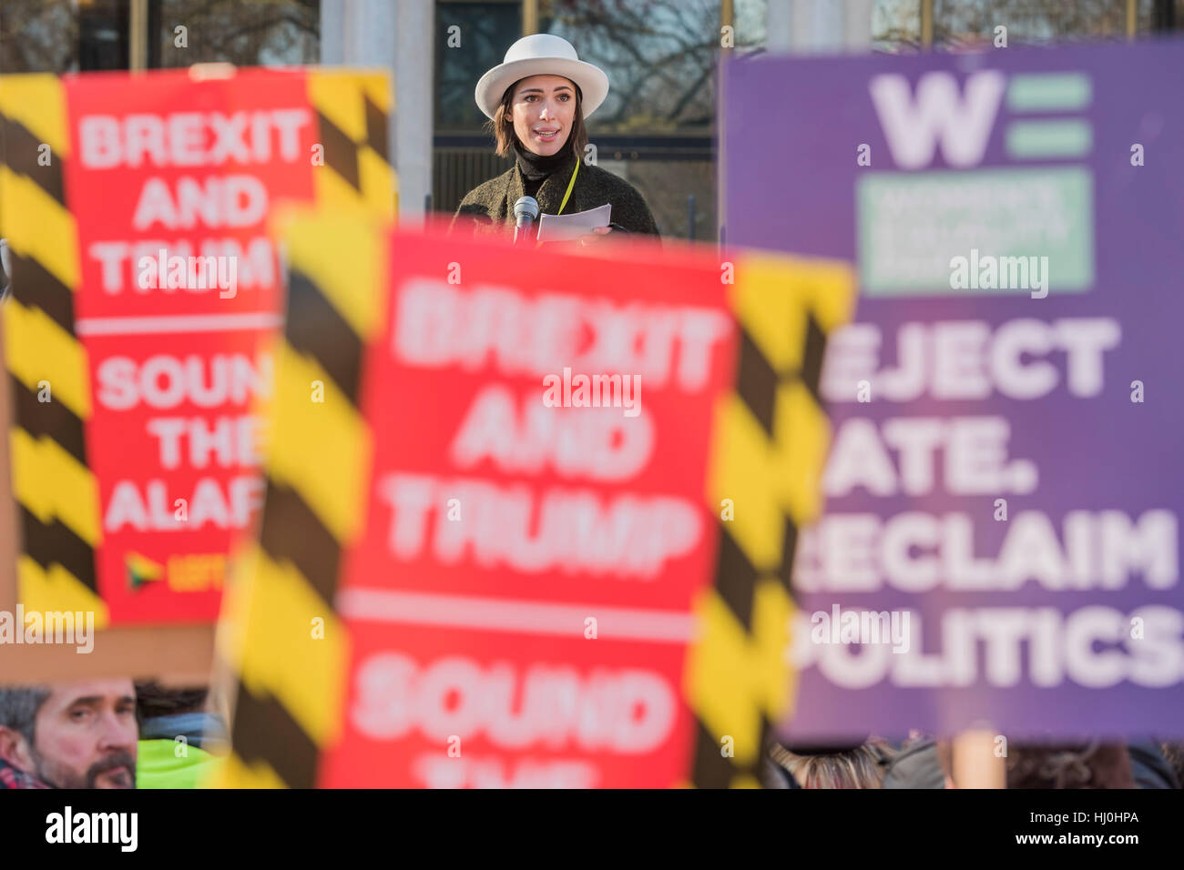 London, UK. 21st January, 2017. Rebecca Hall, actress, introduces speakers outside the US Embassy - Women's March on London - a grassroots movement of women has organised marches around the world to assert the 'positive values that the politics of fear denies' on the first day of Donald Trump’s Presidency. Their supporters include: Amnesty International, Greenpeace, ActionAid UK, Oxfam GB, The Green Party, Pride London, Unite the Union, NUS, 50:50 Parliament, Stop The War Coalition, CND. Credit: Guy Bell/Alamy Live News Stock Photo