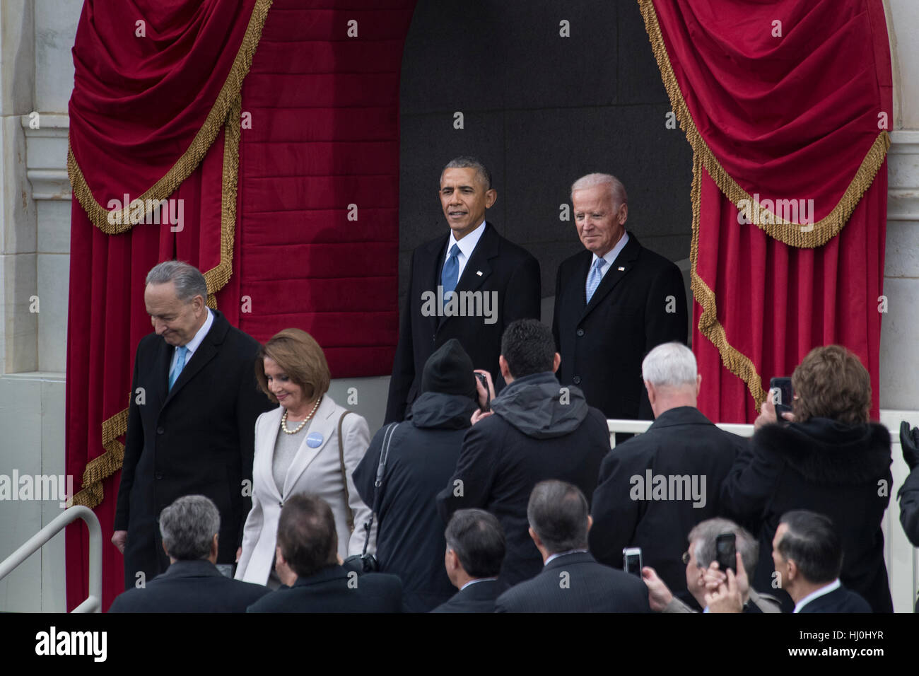 Washington, USA. 20th Jan, 2017. U.S. President Barak Obama and Vice President Joe Biden arrive at the East Front of the Capital for the Inauguration of President Elect Donald Trump to become the 45th President of the United States.  President of the United States on Jan. 20, 2017. Credit: charlie archambault/Alamy Live News Stock Photo