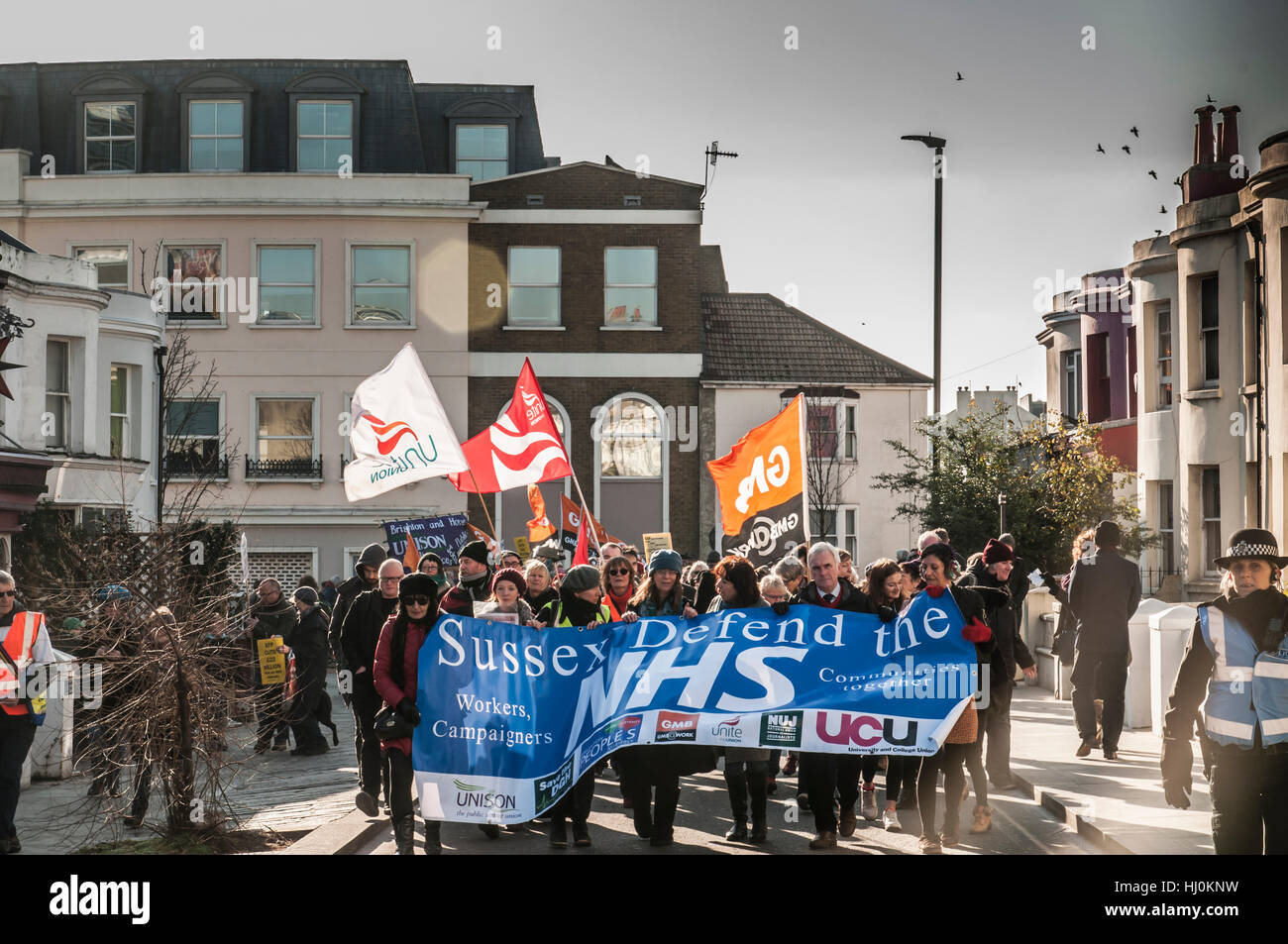 Brighton, Sussex, UK..21 January 2017..Hundreds of campaigners fighting to save the NHS attended a march & rally on the South Coast. Labour Shadow Chancellor John McDonnell addressed the rally at Brighton Station citing Tory underfunding of Health & Social Care.. Stock Photo