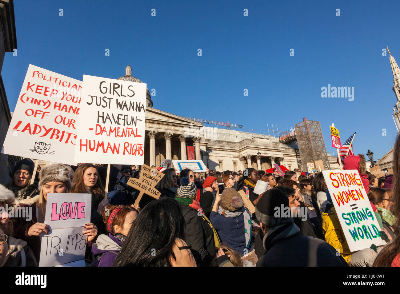 London, United Kingdom, 21st January 2017: Following Donald Trump's inauguration on 20th January, 100,000 protesters have marched in London to express their opposition to his controversial presidency. Demonstrators walked from the American Embassy in Grosvenor Square, to Trafalgar Square, and the Women's March on London was one of hundreds of protests taking place in major cities around the world on Saturday. Credit: galit seligmann/Alamy Live News Stock Photo