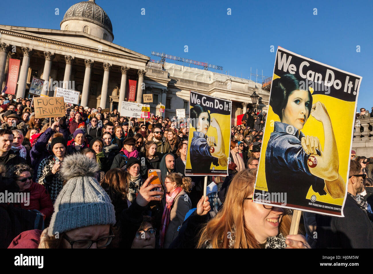 London, United Kingdom, 21st January 2017: Following Donald Trump's inauguration on 20th January, 100,000 protesters have marched in London to express their opposition to his controversial presidency. Demonstrators walked from the American Embassy in Grosvenor Square, to Trafalgar Square, and the Women's March on London was one of hundreds of protests taking place in major cities around the world on Saturday. Credit: galit seligmann/Alamy Live News Stock Photo