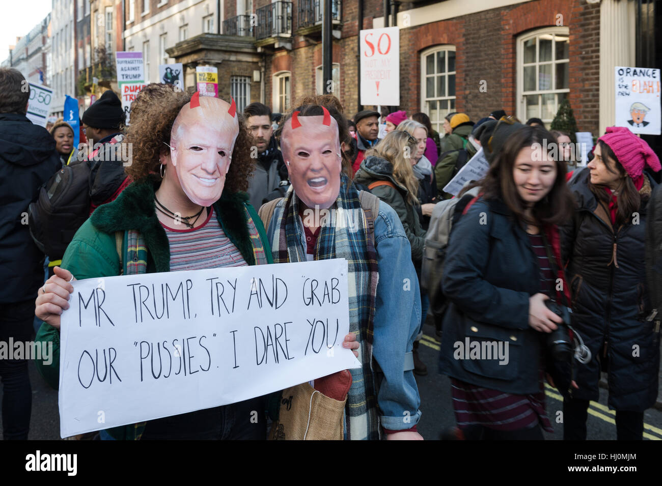 London, UK. 21st January 2017. Around 100,000 people attended 'Women's March on London' as part of a global day of action on the first day of Donald Trump's presidency. Participants marched from the location of the American embassy in Grosvenor Square to Trafalgar Square in a protest against the 'politics of fear' as well as to defend human rights for all and promote civil liberties. Wiktor Szymanowicz/Alamy Live News Stock Photo