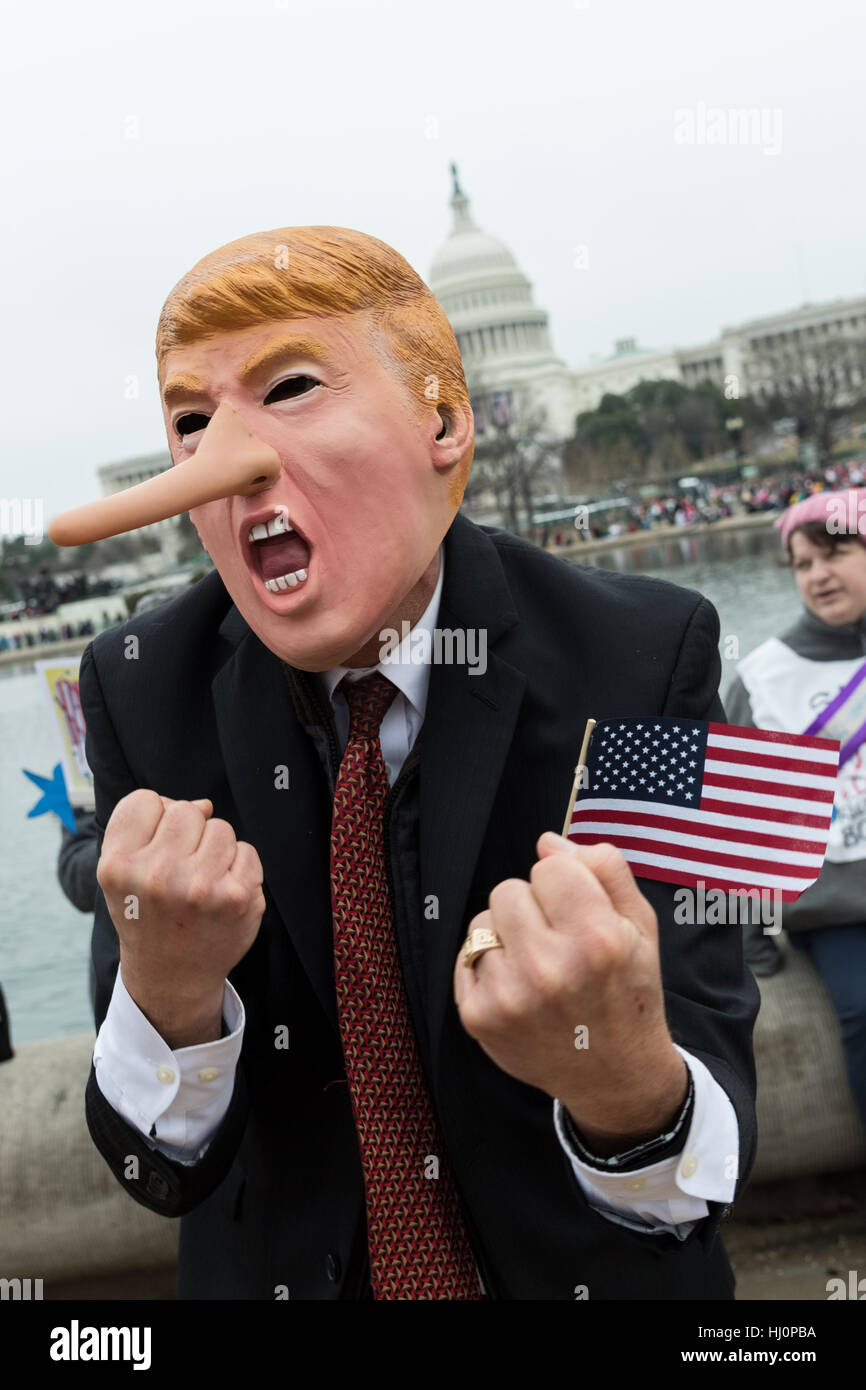 Washington, USA. 21st Jan, 2017.A demonstrator wearing a Donald Trump costume during the Women's March on Washingtonin Washington, DC. More than 500,000 people crammed the National Mall in a peaceful and festival rally in a rebuke of the new president. Credit: Planetpix/Alamy Live News Stock Photo