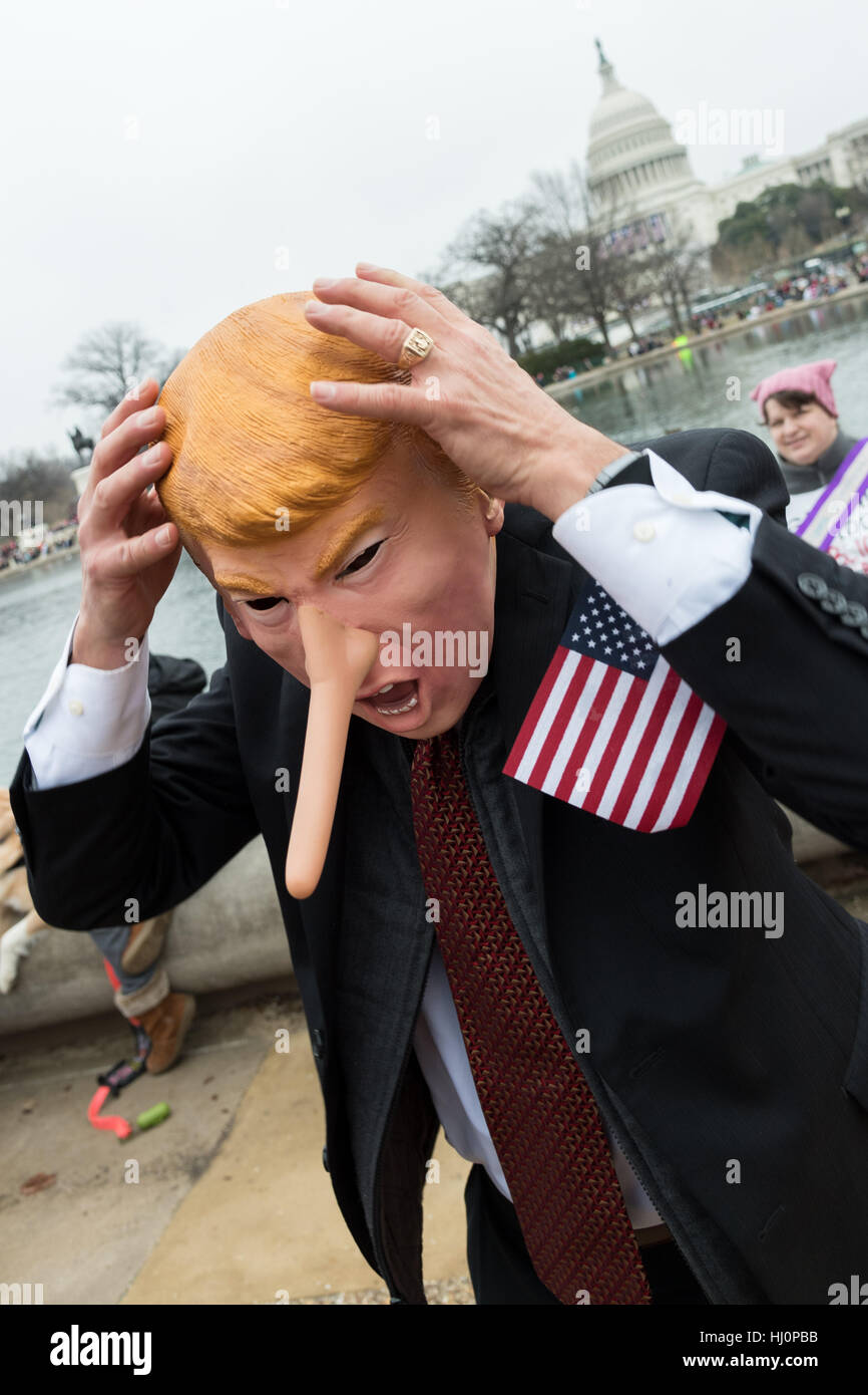 Washington, USA. 21st Jan, 2017.A demonstrator wearing a Donald Trump costume during the Women's March on Washingtonin Washington, DC. More than 500,000 people crammed the National Mall in a peaceful and festival rally in a rebuke of the new president. Credit: Planetpix/Alamy Live News Stock Photo