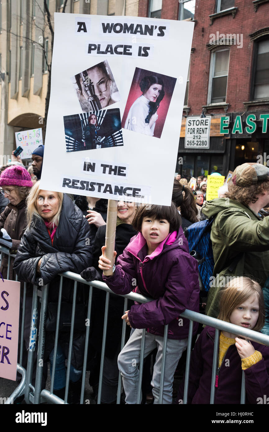 New York, NY, USA. 21st January 2017. Women's March on NYC.  A young girl holds a Star Wars themed sign during the march. Credit: Matthew Cherchio/Alamy Live News Stock Photo