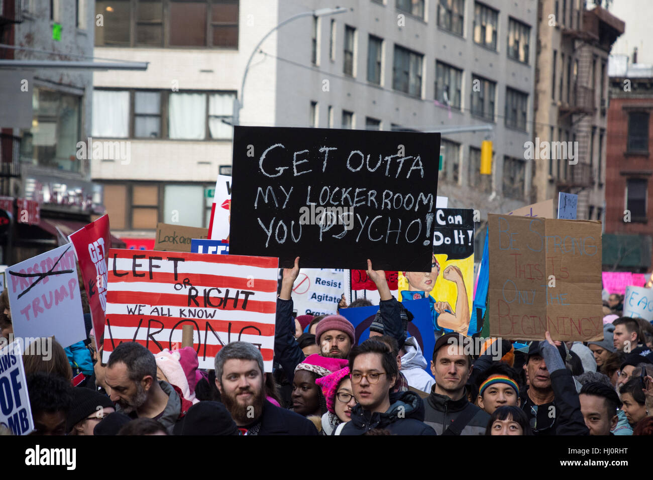 New York, NY, USA. 21st January 2017. Women's March on NYC.  A protester carries a sign reading 'get outta my lockerroom you psycho!' during the march. Credit: Matthew Cherchio/Alamy Live News Stock Photo