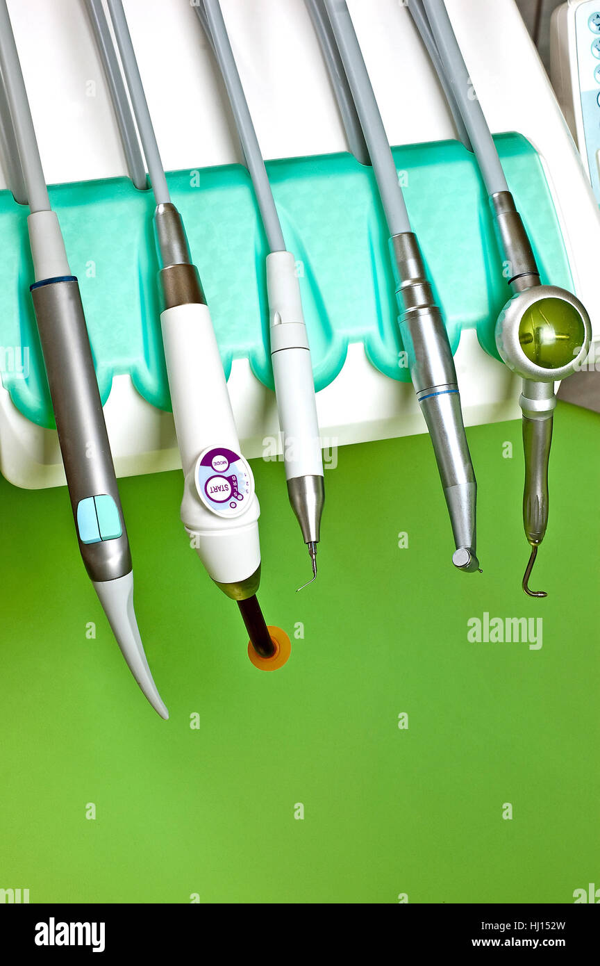 Dentist tools set with drill on rack Stock Photo Alamy