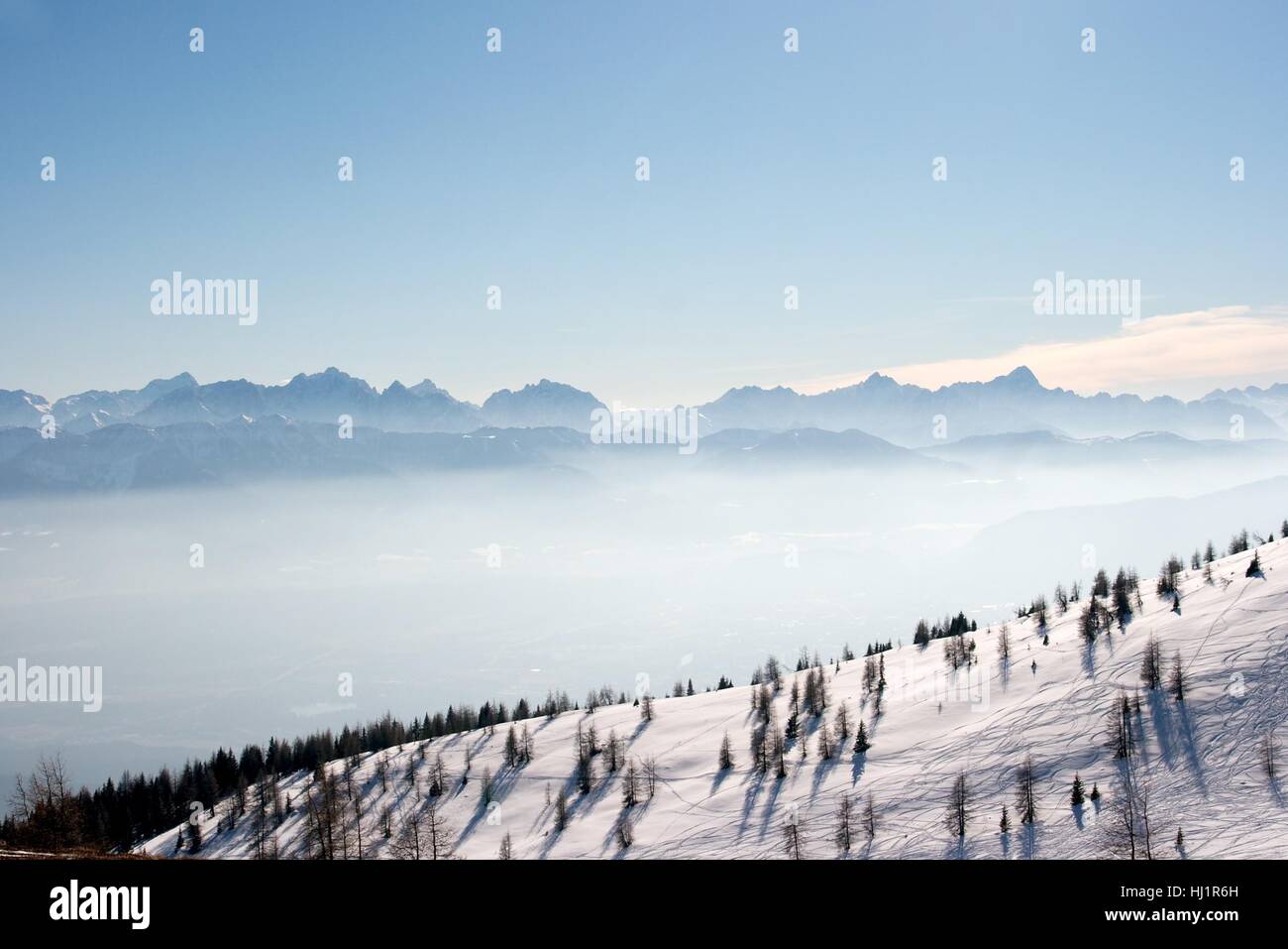 High mountain landscape over the clouds Stock Photo - Alamy