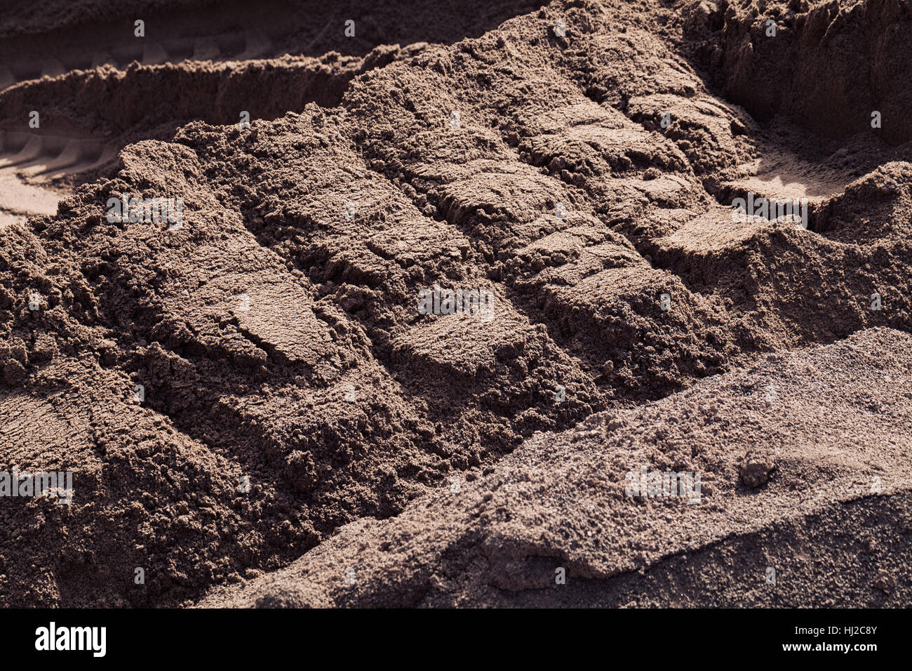Excavator loading aggregate material in hi-res stock photography and ...