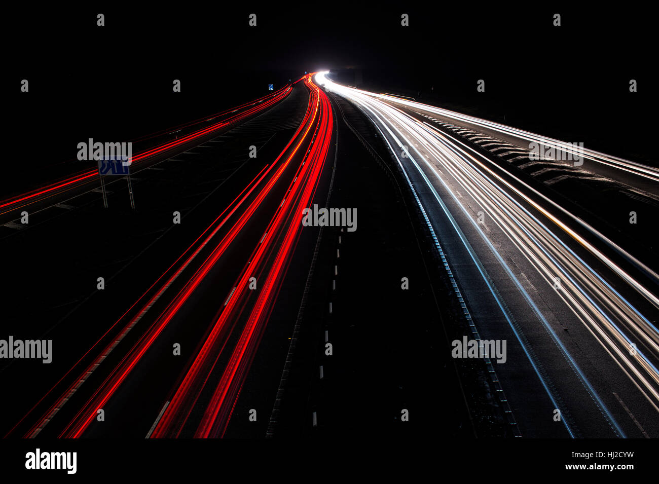 Car lights on the M40 Motorway at night. Oxfordshire, England Stock