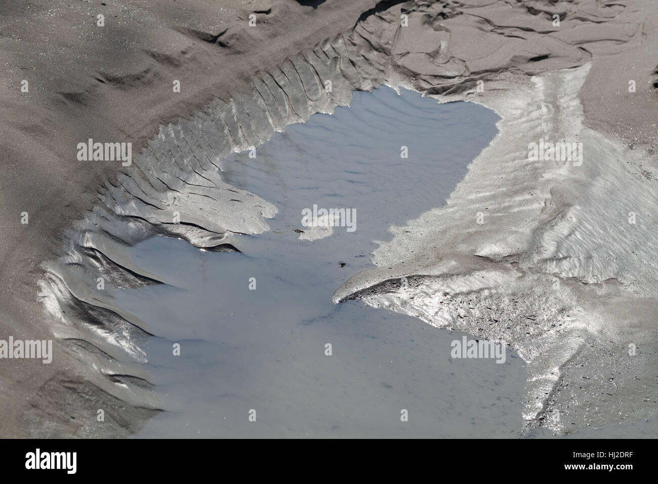 Mud on site after rain, note shallow depth of field Stock Photo - Alamy