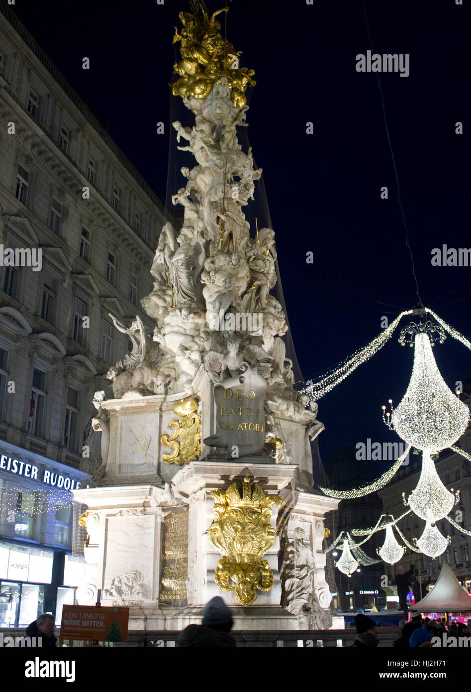 VIENNA, AUSTRIA - JANUARY 1 2016: Night view of Graben street in Vienna during Christmas time, with Pestsaule memorial column in the foreground Stock Photo