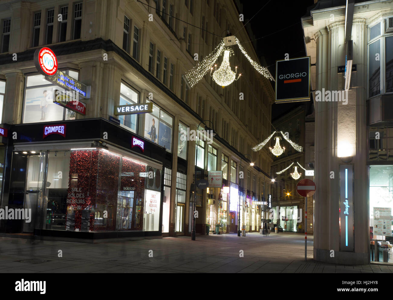 VIENNA, AUSTRIA - JANUARY 3 2016: Night view of Graben street corner with Tratternhof in Vienna during Christmas holiday, long exposure shot Stock Photo