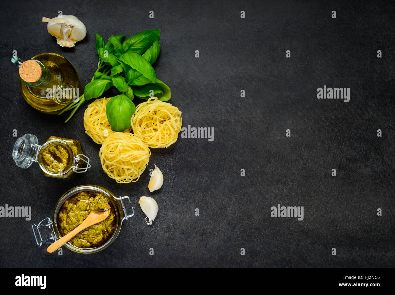 Copy Space Area of Tagliatelle with Pesto and Basil Stock Photo