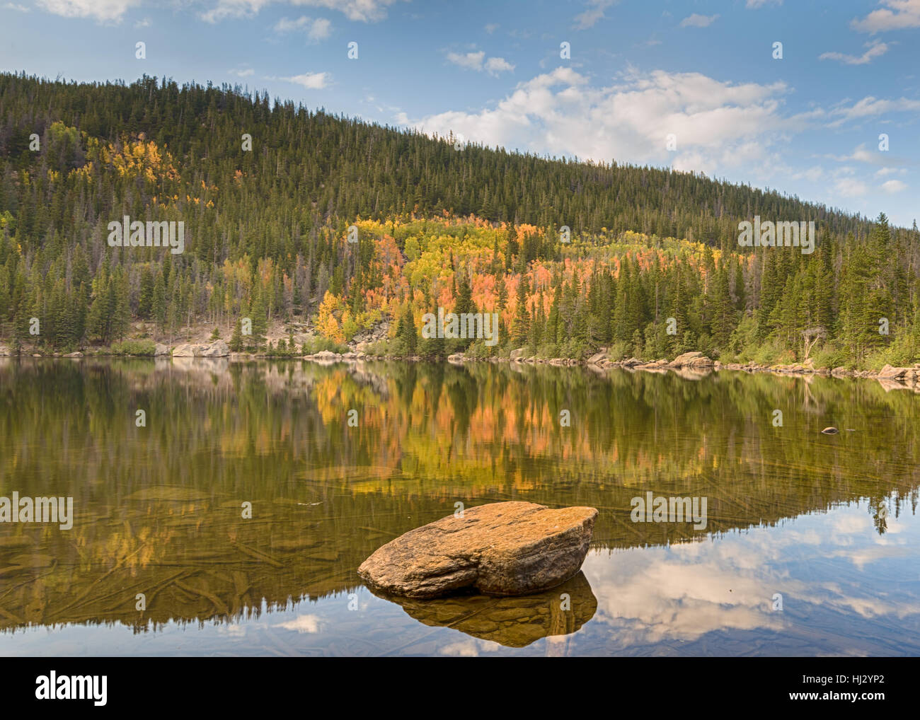 Autumn color reflection at Bear Lake, in Rocky Mountain National Park ...