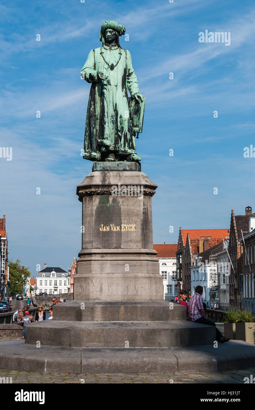 Statue of the Belgian artist Jan Van Eyck stands in Place Jan Van Eyck, Bruges, Belgium Stock Photo