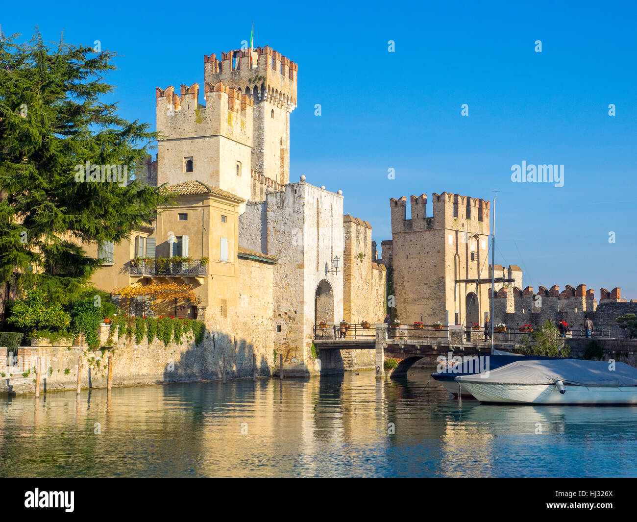 Sirmione ancient castle at the entrance of the old town on Garda lake Stock Photo