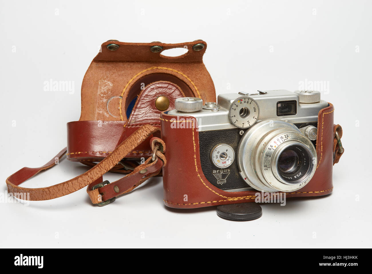 Argus C-Four 35 mm film over black, isolated. Analogic film camera ...