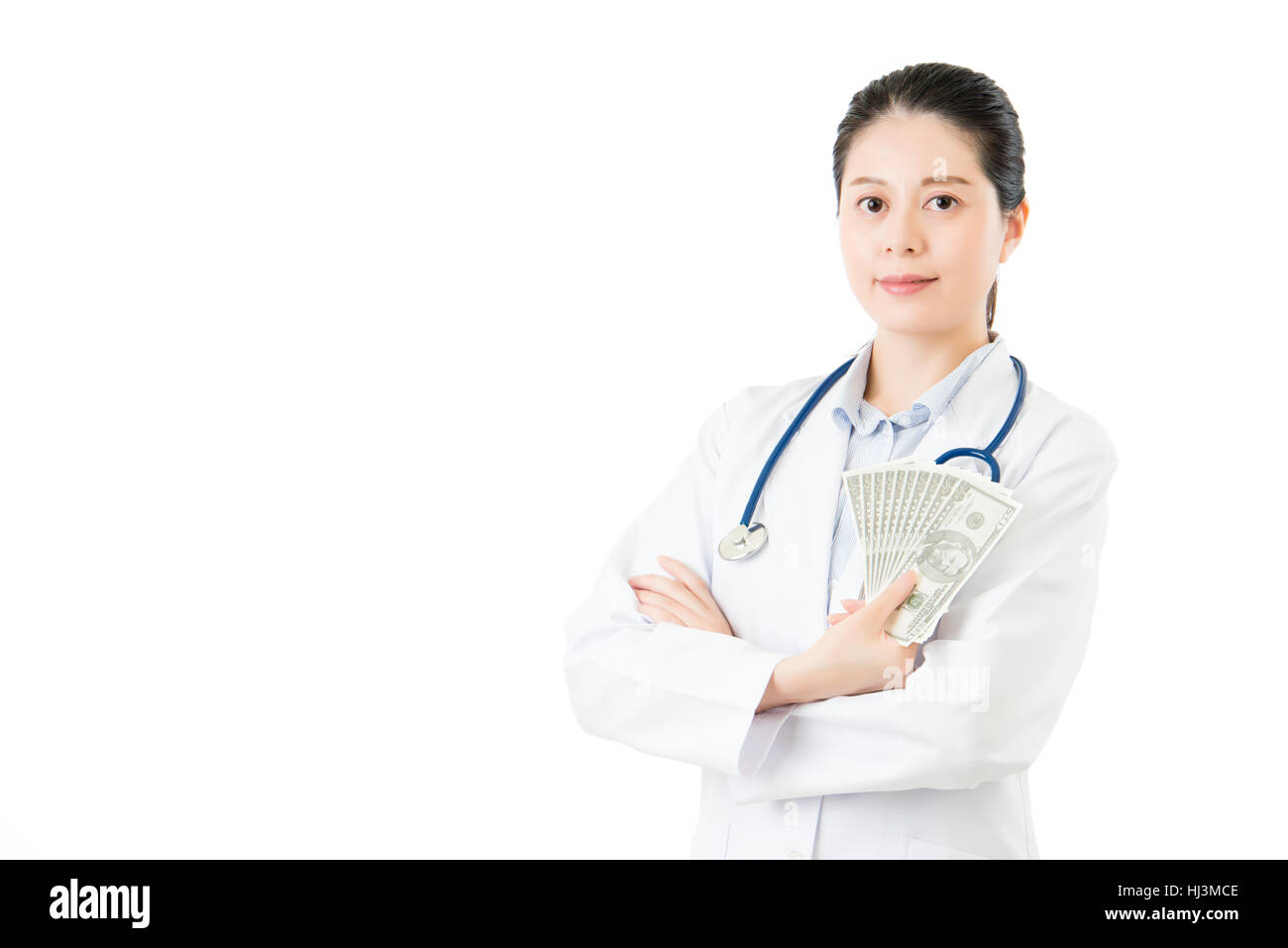 asian woman doctor hold mony cash offering helping medical insurance. isolated on white background. medical and health concept Stock Photo