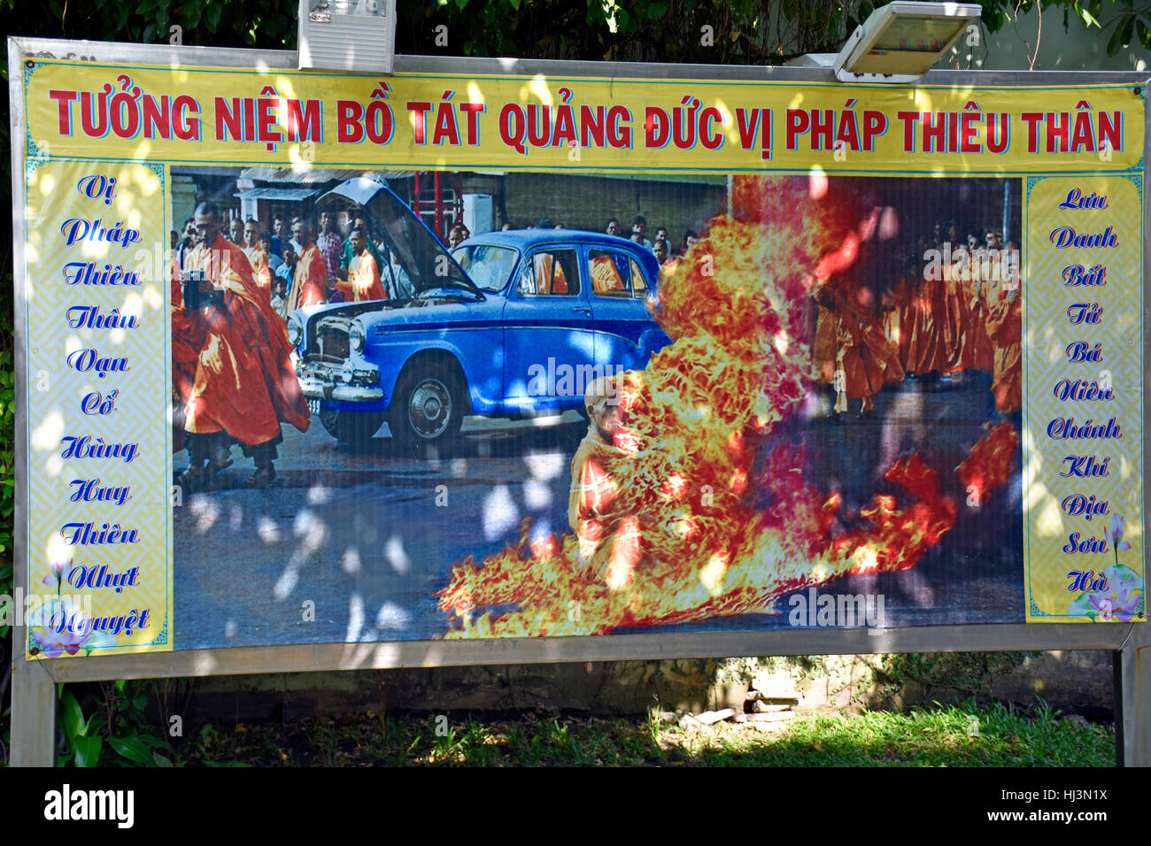 Billboard explaining Buddhist Monk Thich Quang Duc's protest in 1963, Ho Chi Minh City, Vietnam Stock Photo