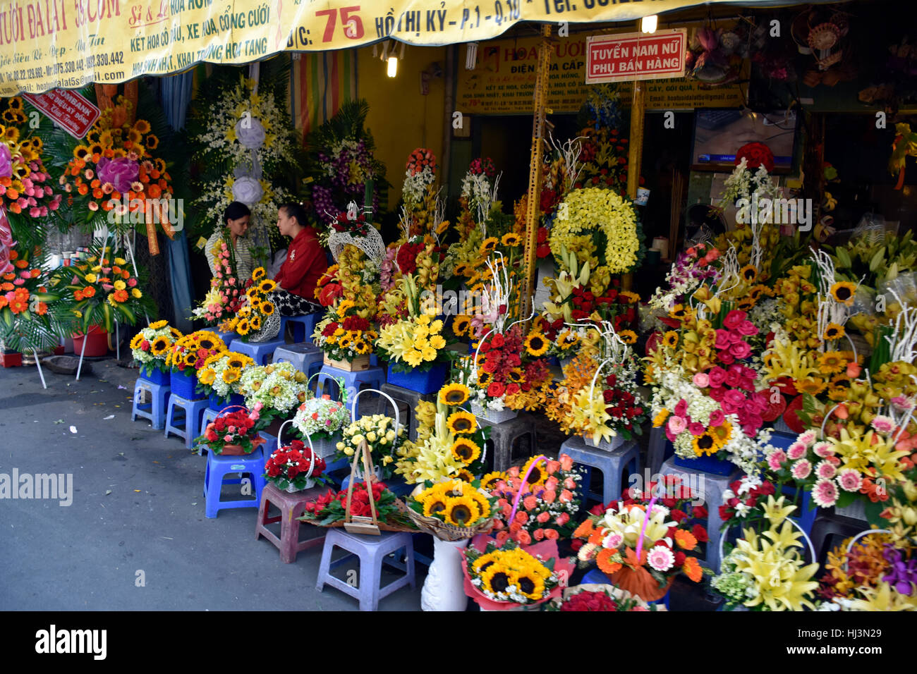 Small flower shops on the streets of Ho Chi Minh City, Vietnam Stock