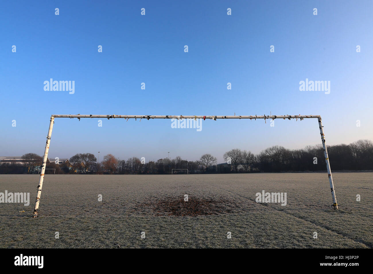 General view of empty football pitches and goalposts. Freezing temperatures and a hard overnight frost bring about the postponement of dozens of Hackn Stock Photo