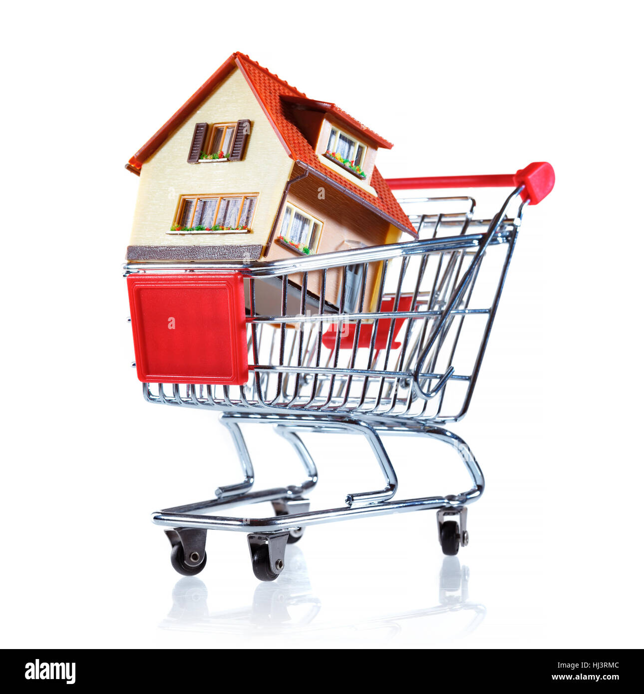 Shopping cart and house on a white background Stock Photo