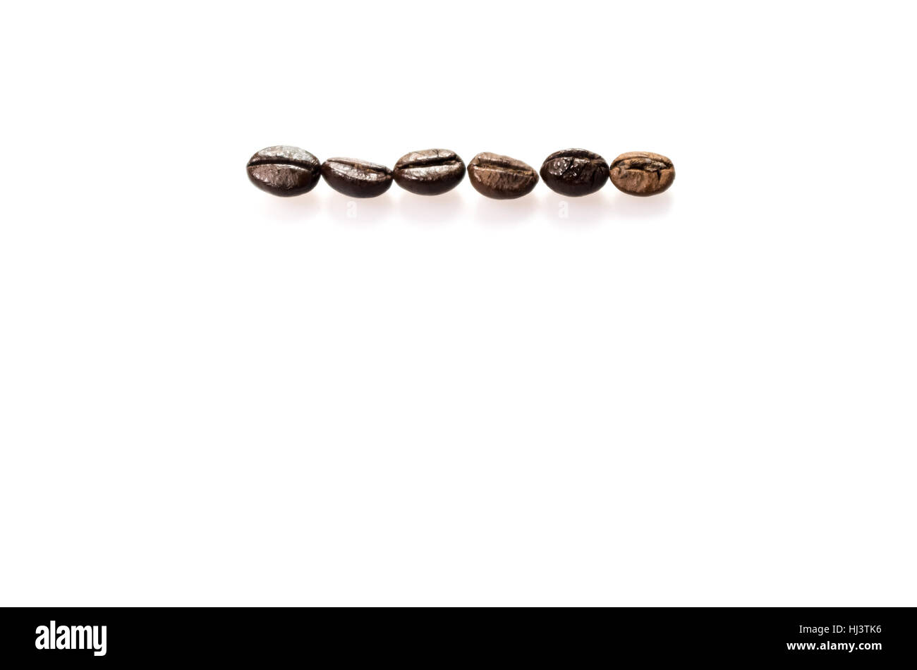 close up of roasted coffee beans isolated on white background Stock ...