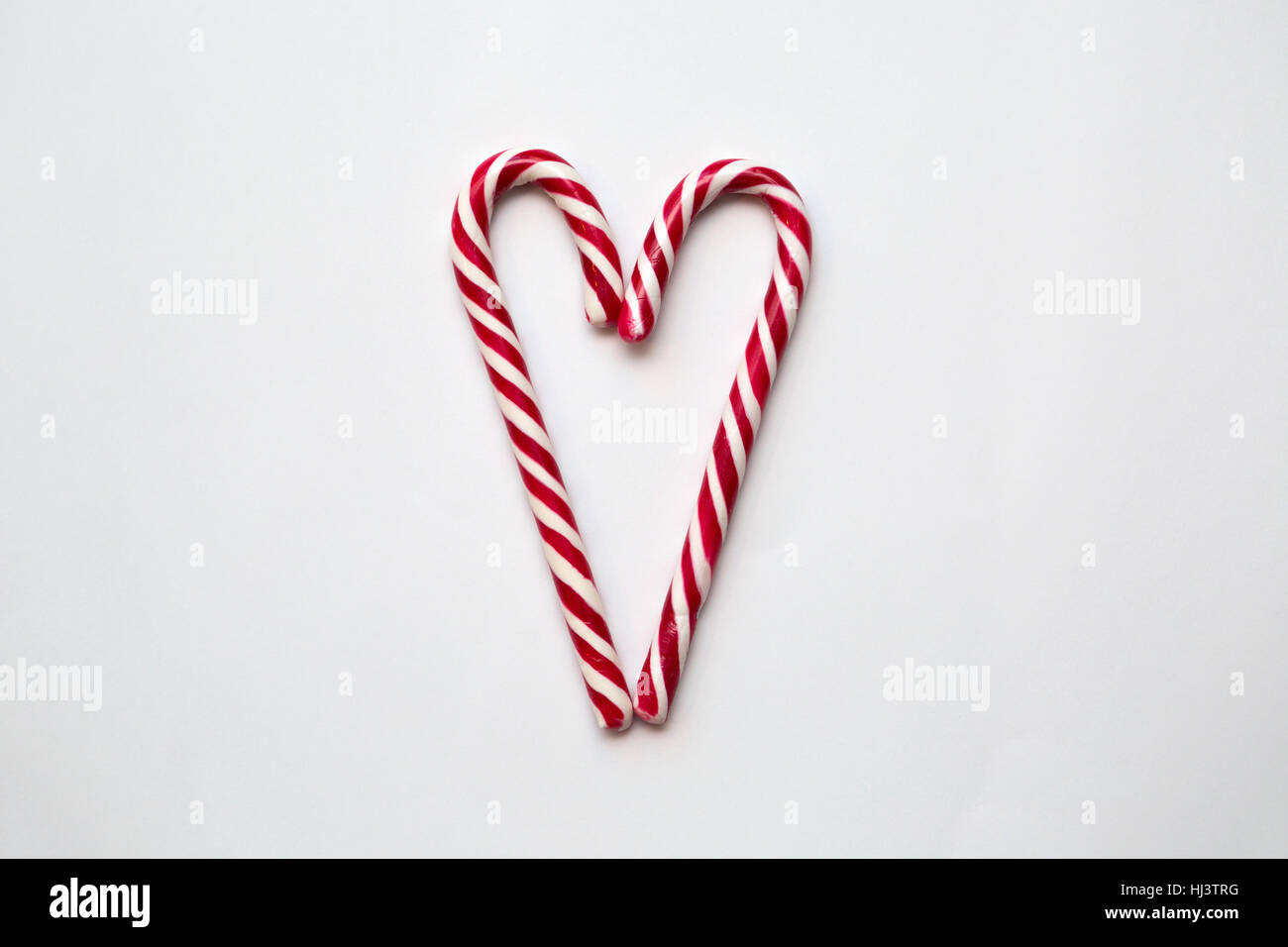 Two Candy Canes Making a Heart Stock Photo