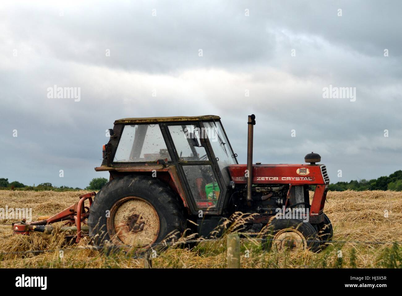 tractor on a farm Stock Photo Alamy