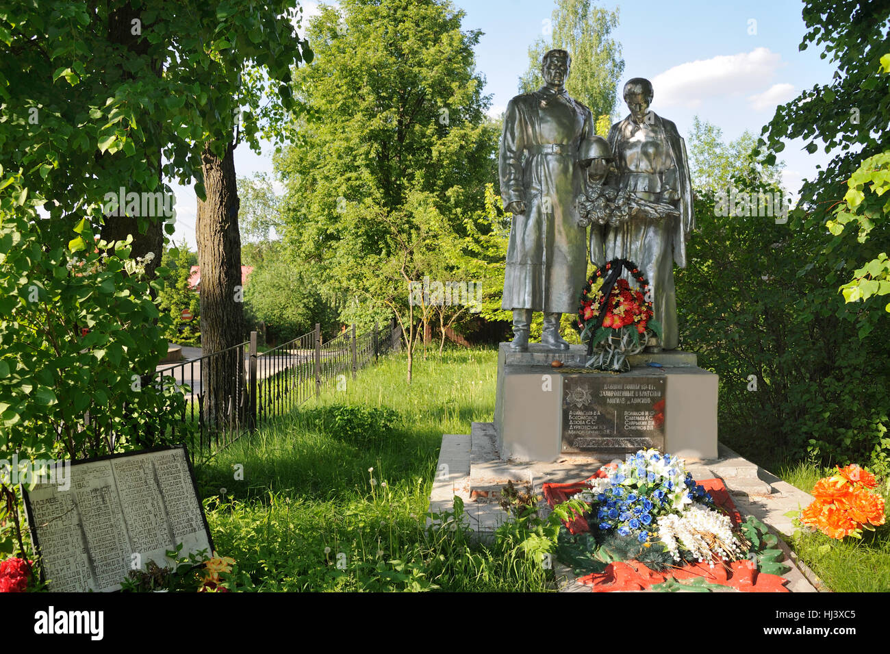 Overall view of Common Burial in Anosino in Summer with Flowers. War memorials in Moscow Region, Russia. Stock Photo
