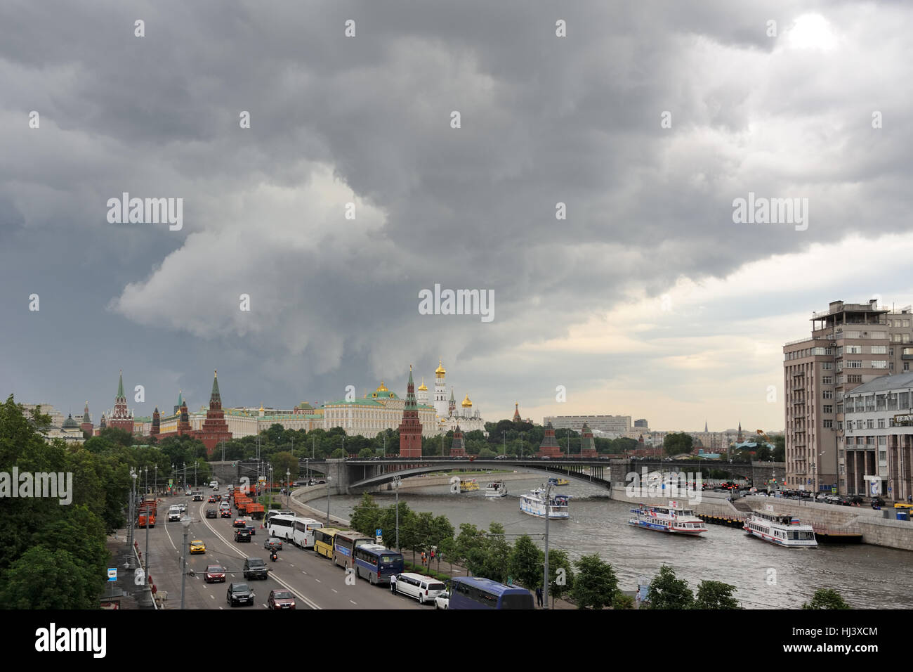 Moscow Under Stormy Clouds. View from Patriarchy Bridge on Moskva River and the architectural ensemble of Moscow Kremlin Stock Photo