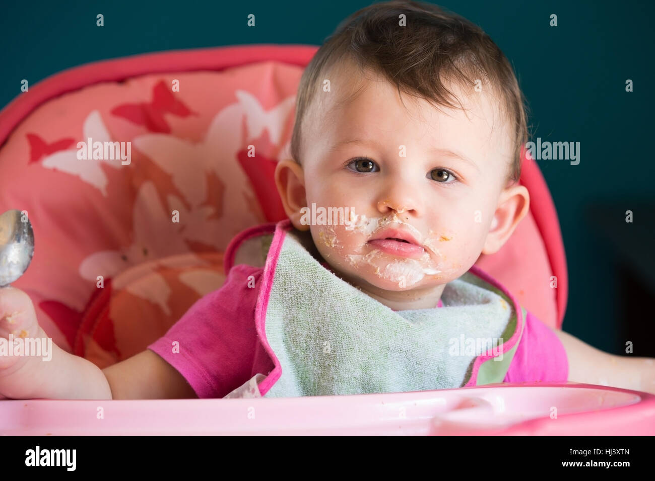Messy Eating with Little Baby Stock Photo