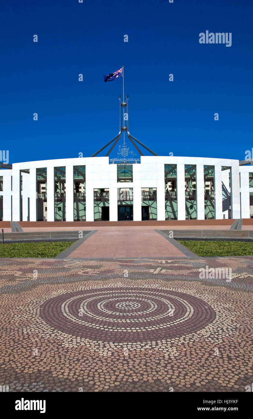 Australian Parliament building with flag and Aboriginal mosaic in the National Capital Stock Photo